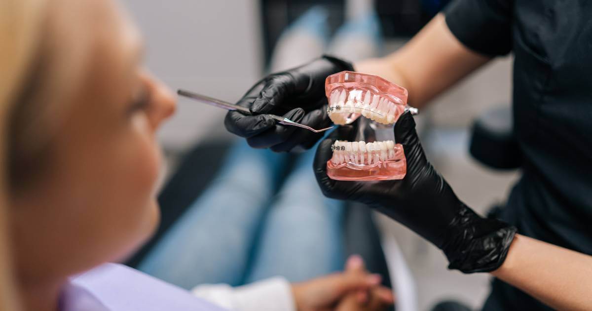 Dentist Explaining Dental Treatment