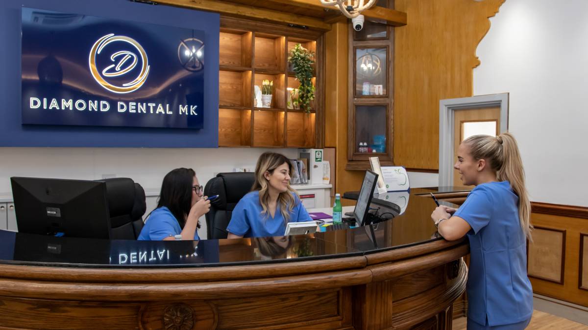 Nurses chat at reception